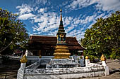 Luang Prabang, Laos - Wat Sop, the temple lay in a nice gardened area with a  that  decorated with small coloured tiles. 